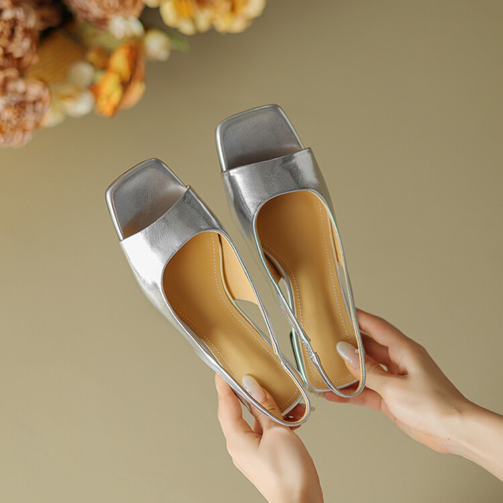 Sandals - Mules de tacón bajo metálico con